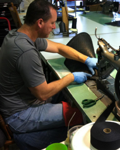 CocoMats.com Employee Rick sewing our proprietary binding around the Cocomats.
